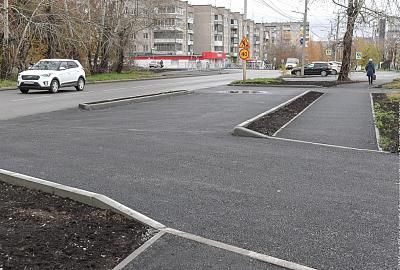 Отремонтированная дорога, построенные тротуары, довольные горожане  